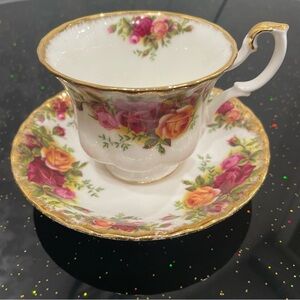 Royal Albert Old country roseVintage Floral Teacup and Saucer with Gold Accents.